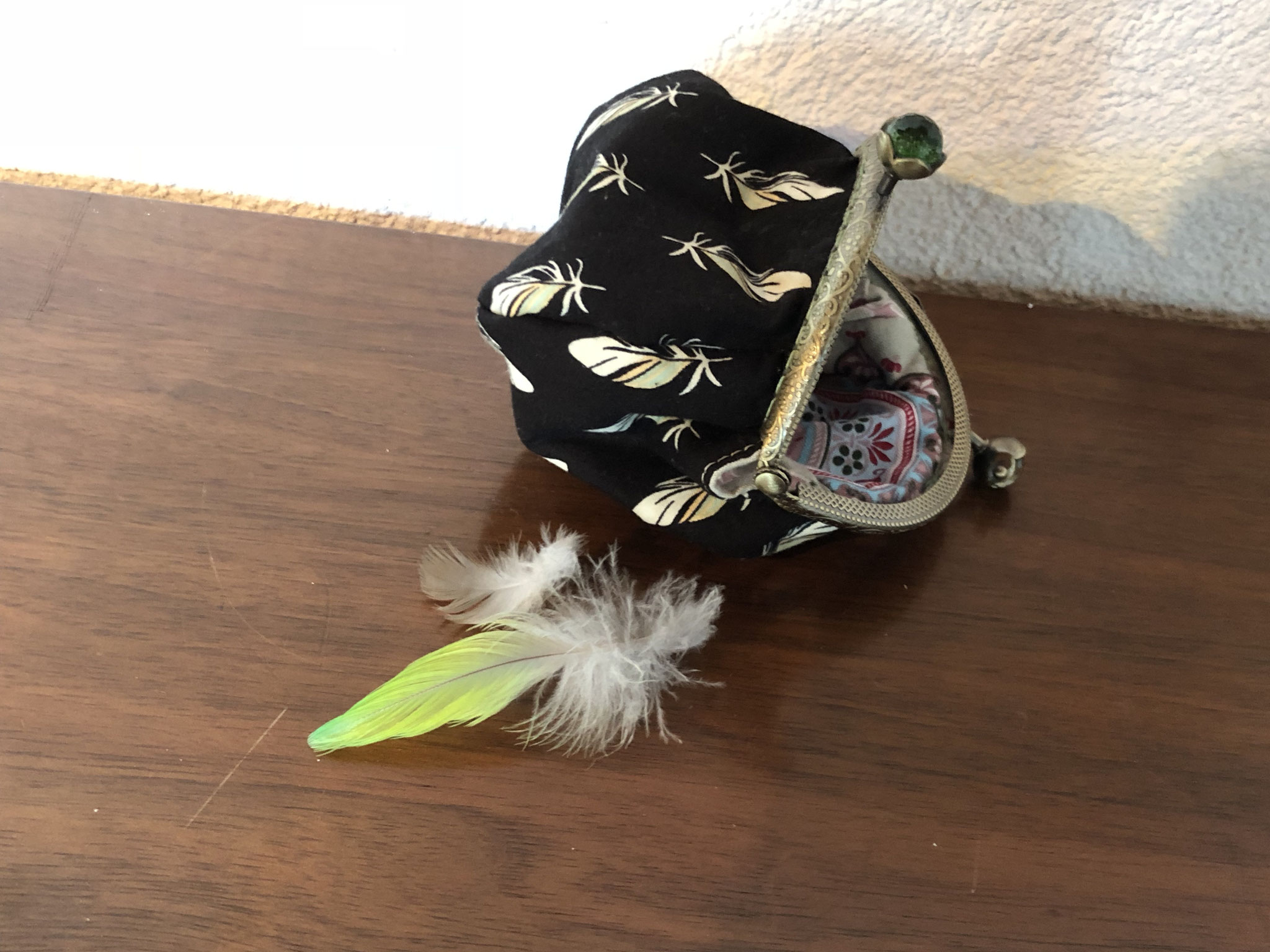 Federn schwarz, verkauft