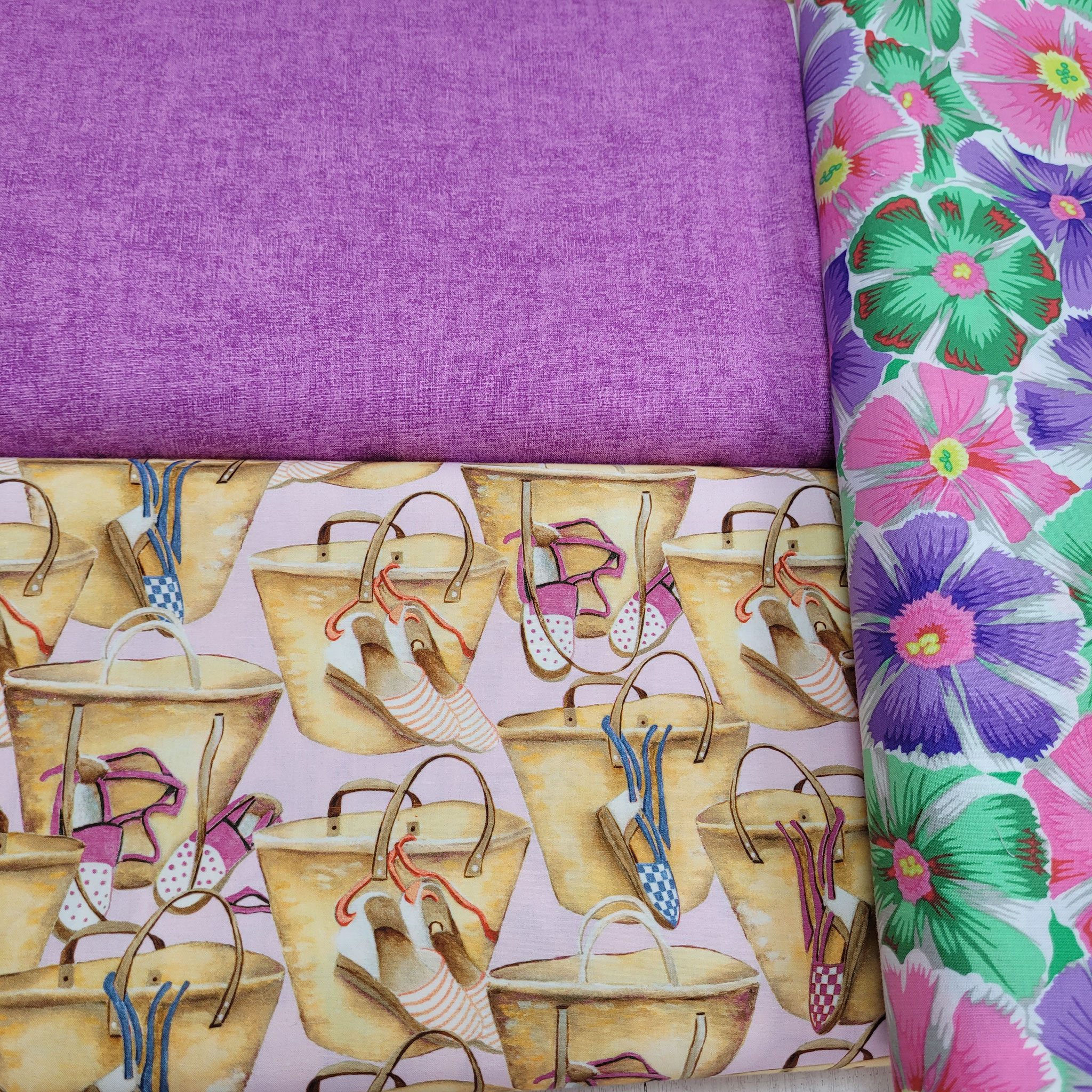Baumwollstoffe mit Blumen und Strandmotiven lila rosa