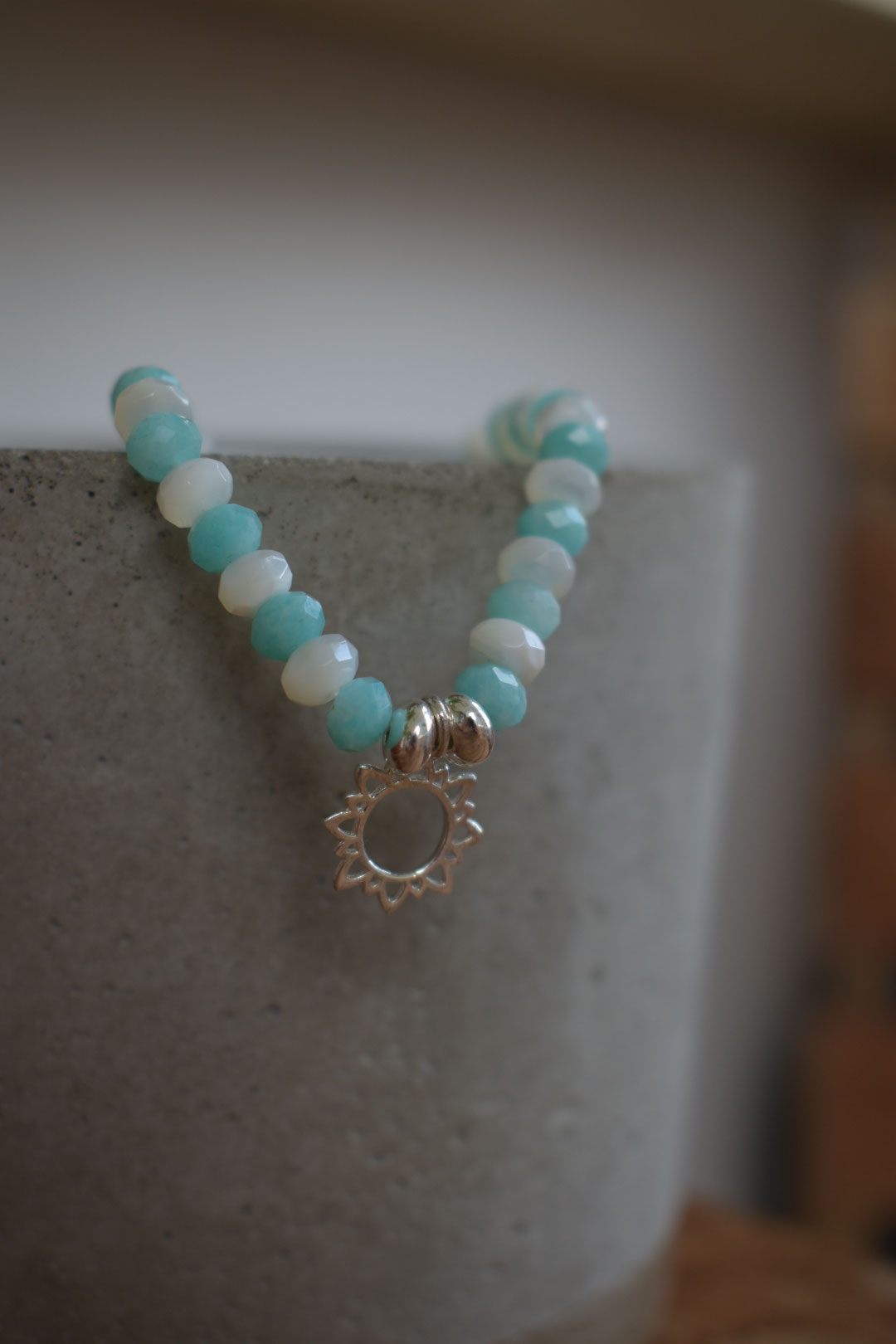 summer vibes: facetted mother-of-pearl and amazonite with silver sun charm (sold)