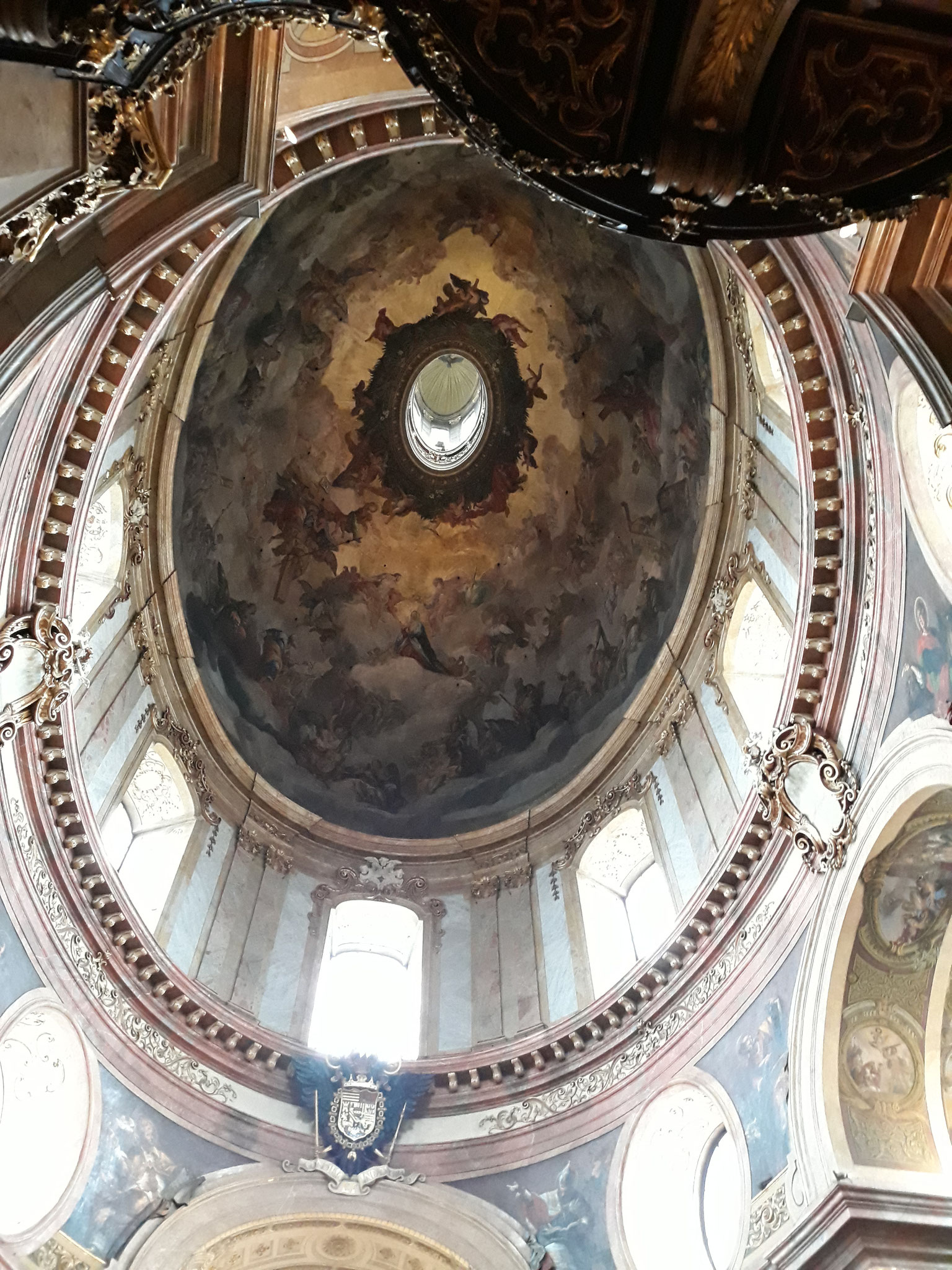 The lantern from inside the Peterskirche and the insignia of Emperor Leopold I.