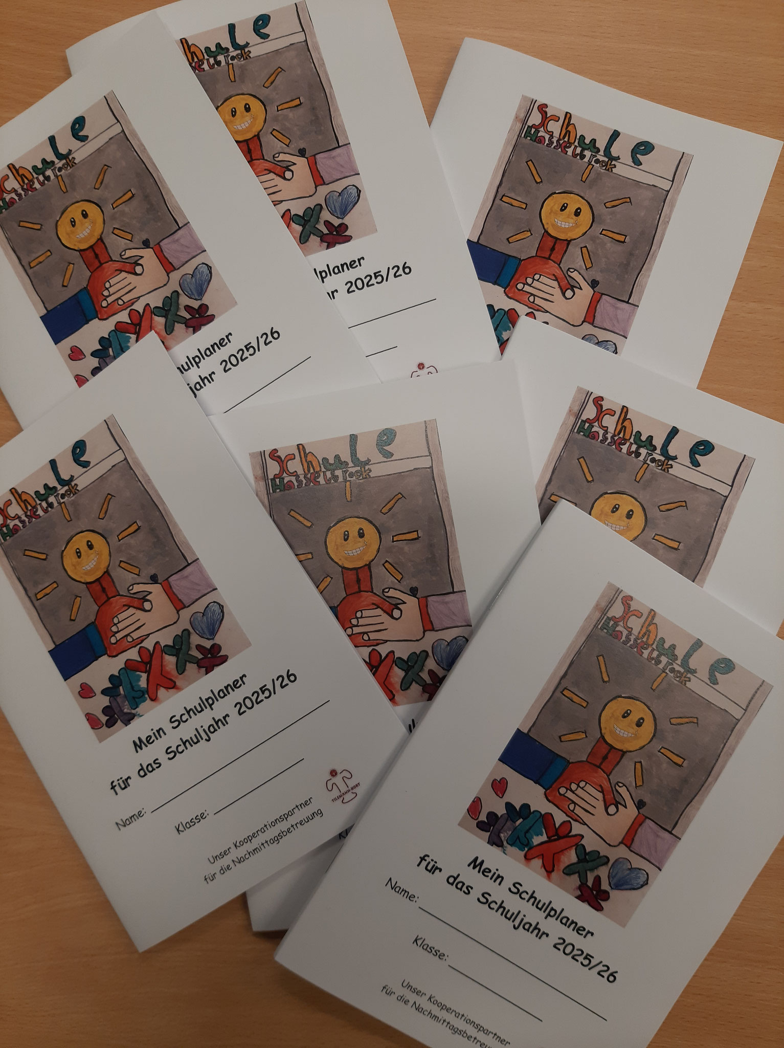 Wir tragen die Hälfte der Kosten für den Schulplaner