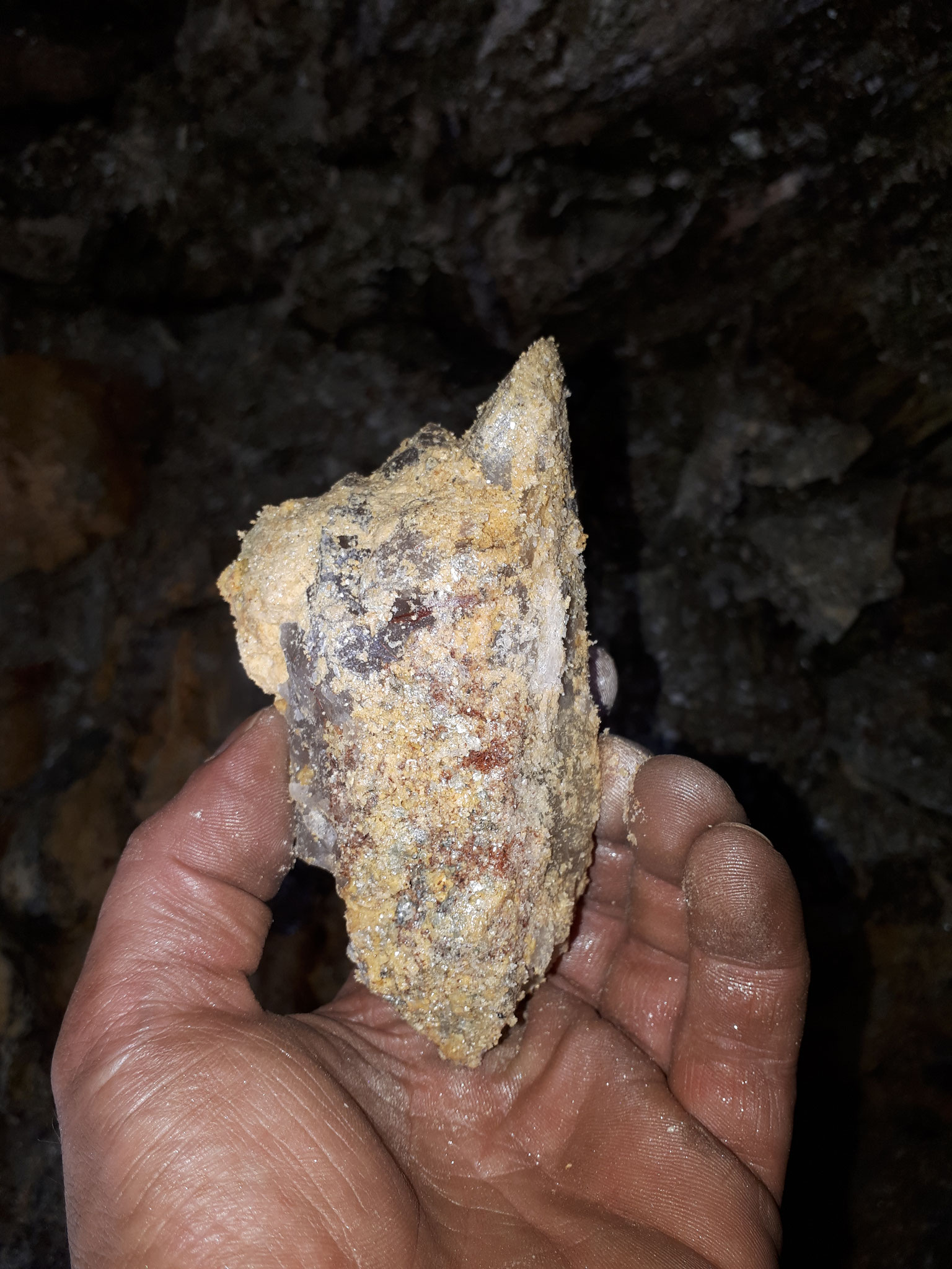 ....Rutile on the bottom of a Rock Crystal specimen....