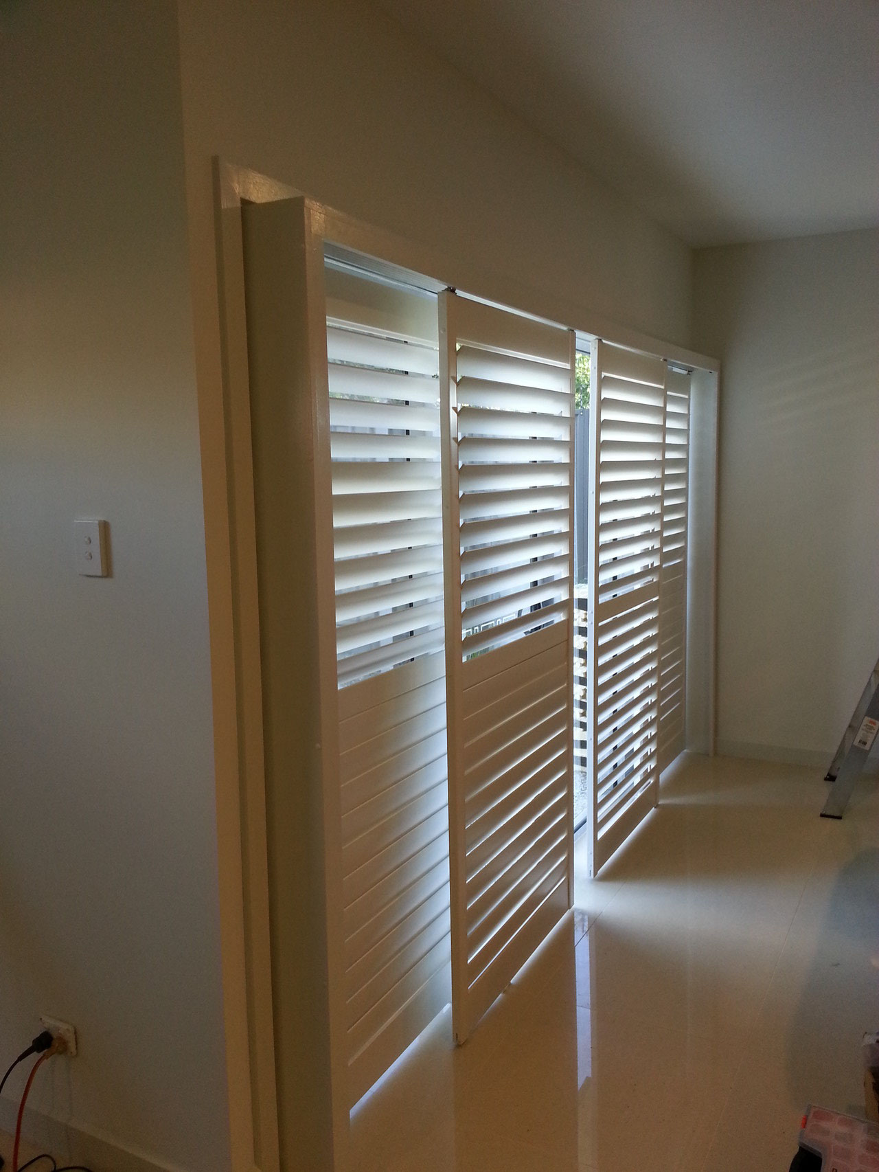 Vinyl Plantation Shutters in Sliding door