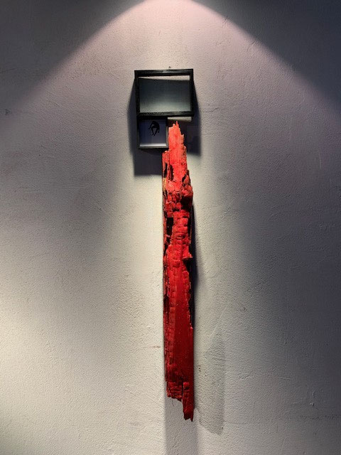 赤いマントの男