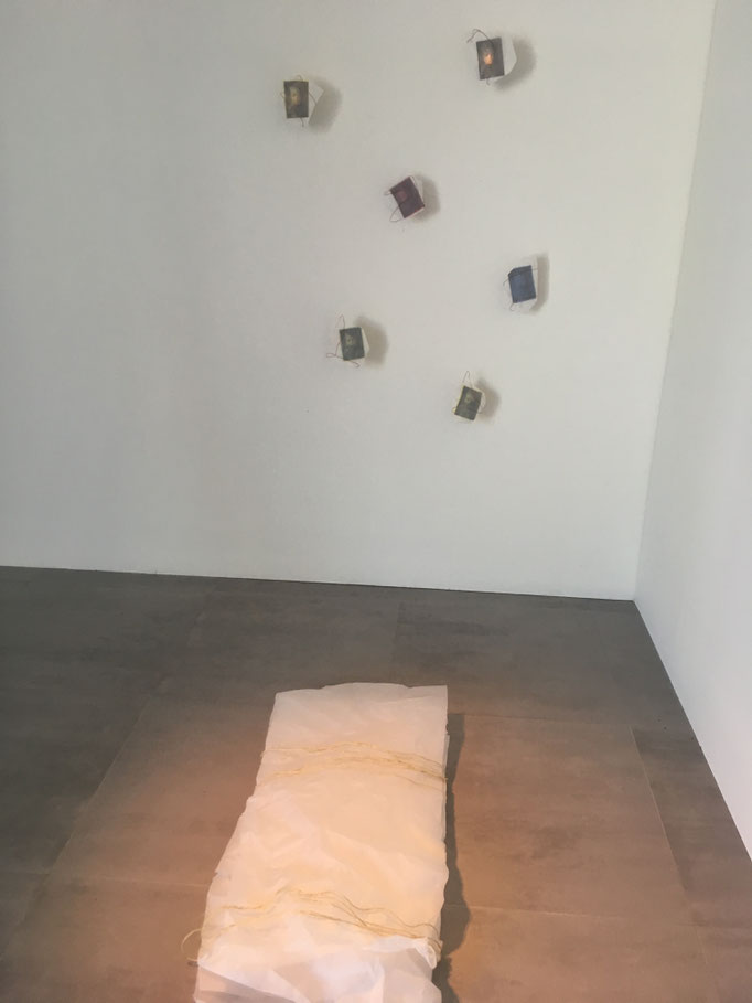 "Damals", 2019, tracing paper, wax paper, copper wire, rope, electrical candle