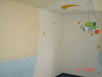 Kinderzimmer mit Lasur und Schablonentechnik.