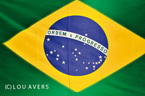Grün wie der Regenwald, Gelb wie die Sonne, Blau wie das Meer - Brasiliens Nationalflagge verheißt "Ordnung und Fortschritt" - (c) Lou Avers