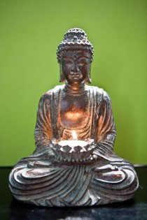 Buddha with candle