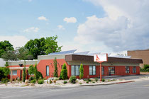 Beautiful Dark Red Hawkwatch International headquarters building in Salt Lake City, Utah