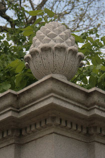 A gate post topped with a pineapple, photographed by Heather Luxion on Flickr (All Rights Reserved) used with her kind permission.