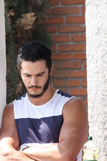 Beto thinking deeply during Julio's baptism prior to our move back the U.S.