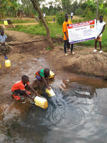 FETCHING WATER IN DIRTY POND