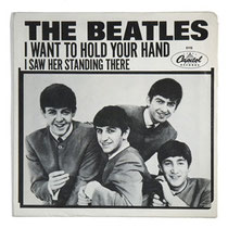 1964 Nr. 1 der Charts: The Beatles. I want to hold your hand. Image: www.rollingstone.com