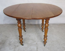 Table ronde en cerisier Louis Philippe à abattants 