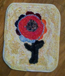 Katie's little mat for a footstool.