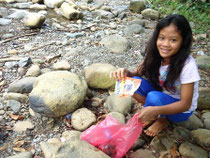 Reydenn Grace participating in coastal and river cleanup activity in their area
