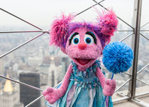 Sesame Street’s Abby Cadabby helped light the Empire State Building blue earlier this week in honor of World Autism Awareness Day. The nonprofit behind Sesame Street is launching a new initiative to help educate the public about the developmental disorder