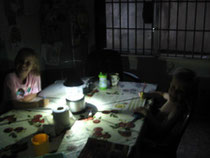 Sometimes, when it is cloudy, the kids do their school work by lantern.