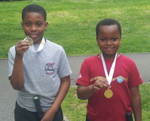 Deji and Max with their medals