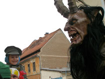 A child's reaction to a mask in a festival parade, Ptuj, Slovenia, 2008. Nicole Harper©