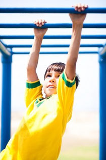 "Smart Kid Playing On Jungle Gym" by photostock