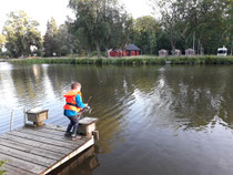Gian trying out fishing