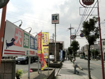 かねだい戸田店の看板が見える