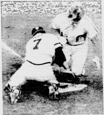 Pete Rose is tagged out at home by Milt May in the 2nd inning.