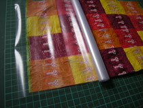 Laminierfolie auf den Quilt legen