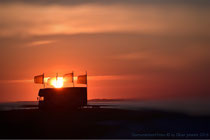 Die Kiteschule bei Sonnenuntergang am Strand