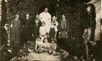 Mary Alice Berg (in back) with Amanda, Gladys, Bernice on her far left, Alice, Lucille, Evelyn and neighbor children