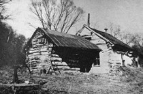 Ole Sorhus log cabin in 1944, Big Spring, Fillmore County, Minnesota. From Minnesota History Center
