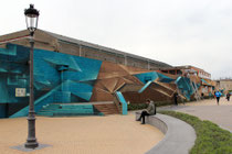 Die Crew Disorderline aus Belgien hat eine triste Wand im Stil einer Dünenlandschaft bemalt.