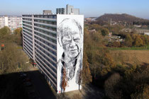 Hendrik ECB Beikirch, ein 40m hohes Mural, Portrait eines alten Fischer, der seiner Arbeit nicht mehr nachkommen kann.
