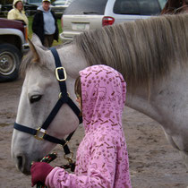 Horses and handlers enJoy each other.