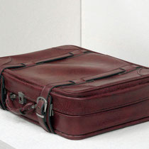 Code Maroon (Stay or Go) 2-2011: found vinyl suitcase, plywood, acrylic, screws:46W x 60L x 50 H cm 