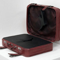 Code Maroon (Stay or Go) 2-2011: found vinyl suitcase, plywood, acrylic, screws:46W x 60L x 50 H cm 