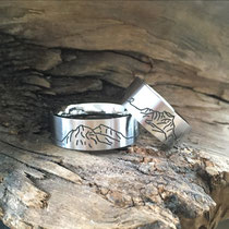 Trauringe Edelstahl mit Lasergravur Bergkette