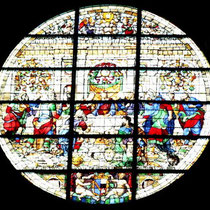 Sienne - Le duomo - Vitrail de la façade représentant la Cène et la Vierge.