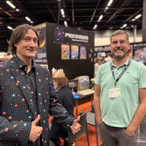 Das Bild zu Männerquatsch Podcast Folge 197 zeigt den Stand von Protovision in der Retro Area auf der Gamescom 2025.