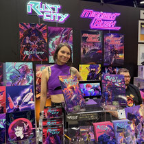 Das Bild zu Männerquatsch Podcast Folge 197 zeigt den Rust City Comic Stand in der Retro Area auf der Gamescom 2025.