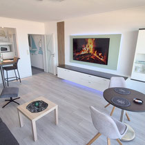 Gemütlicher Wohnbereich im Nautilus Penthouse mit Blick zur Nordsee