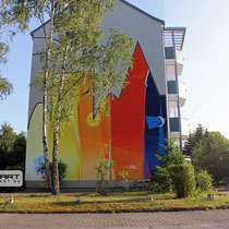Airbrush Malerei von dem Team der Graffiti Agentur Appolloart . Aus Grau wird farbige Wandgestaltung 