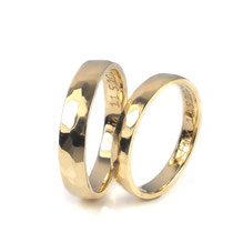 Trauringe in Gelbgold 750/000 3.5 + 2.8 mm mit gehämmerter und polierter Oberfläche