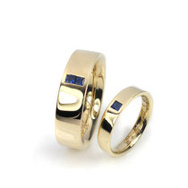 Trauringe in sattem Gelbgold mit blauen Saphiren