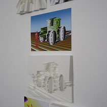 Racer Malevich in Front of a Tractor — 3D-printed relief of the design: a white relief shows the Racer Malevich figure standing beside a large tractor in a geometric landscape, next to a print of the 3D design.