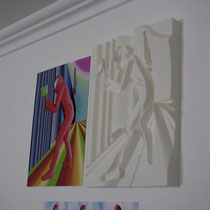 Racer Malevich with an Axe — 3D-printed relief with variable LED lighting: the relief of the figure with an axe is illuminated in pink and turquoise tones, altering the perception of depth.