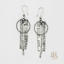 Aretes hechos a mano en plata 950.