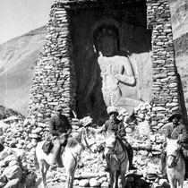 Count Ilya Tolstoy, left, Captain Brooke Dolan, centre, and a mounted Gurkha guide can be seen riding across Tibet in 1942.