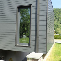 Extension d'une habitation - Matériaux : ardoises et pierre